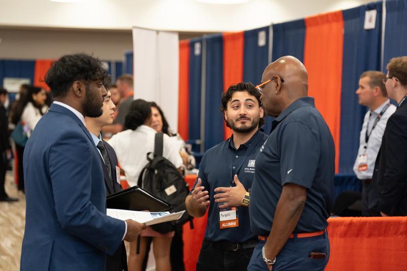Recruiter and student talking at Career Fair