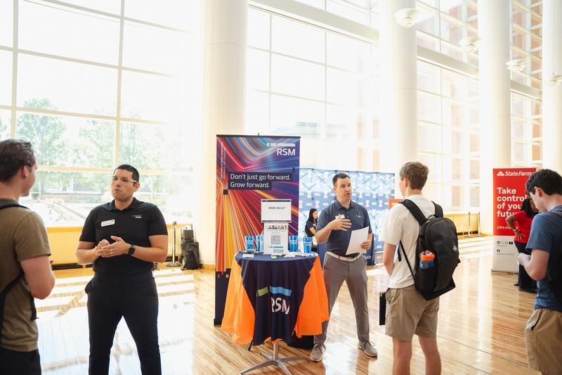 Student and recruiter engaging at employer showcase
