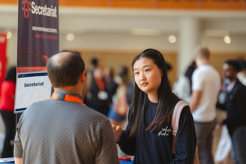 Employer and student engaging at an employer showcase