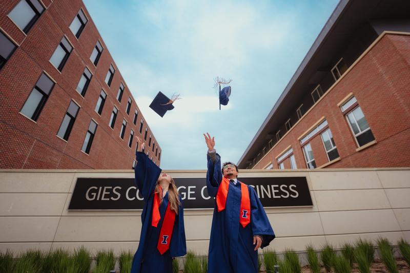 Students in graduation cap and gown